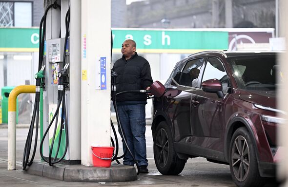 A motorist refuels a vehicle with diesel fuel at a BP petrol station in east London, on March 9, 2026. Stock markets plunged Mon