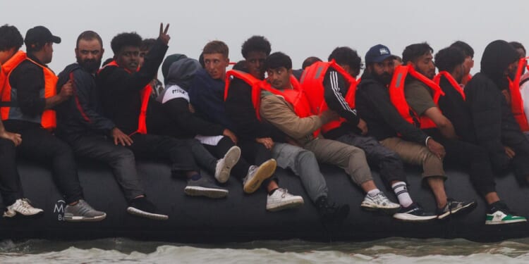 Britain spending one-fifth of entire aid budget housing asylum seekers as 'serious risk' exposed