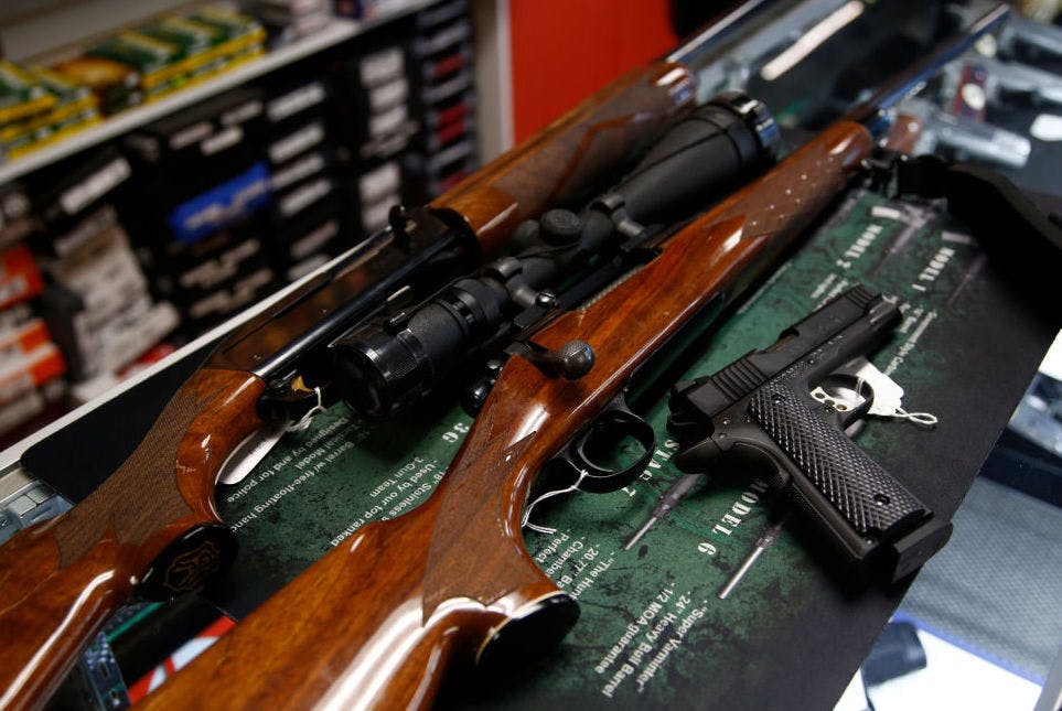 STOKESDALE, NC - MARCH 26: A Remington 700 hunting rifle, a Remington 1100 shotgun and a Remington R1 Enhanced model 1911 pistol are seen for sale at Atlantic Outdoors gun shop on March 26, 2018 in Stokesdale, North Carolina. Founded in 1816, Remington is one of America's oldest gun and ammunition manufacturers which now has filed for Chapter 11 bankruptcy protection partially due to an estimated $950 million in debt.