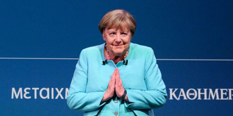 Angela Merkel demands 'people with a migrant background' vote against right-wing AfD party