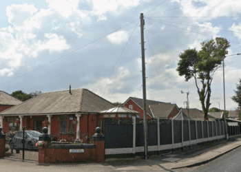 Pensioners forced to tear down £4,500 fence after neighbours complained it was 'intrusive of area’s character'