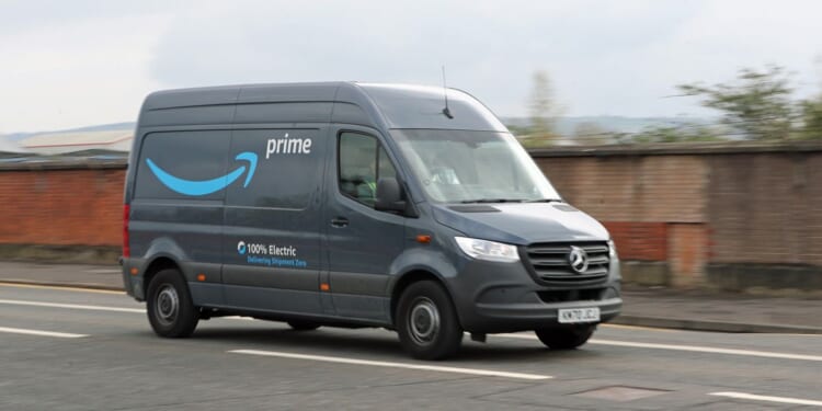 Amazon delivery driver caught on CCTV hurling package into garden as residents left in disbelief
