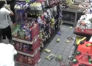 Sacramento gas station plunged into chaos as rampaging teenage mob storms store and vandalises aisles