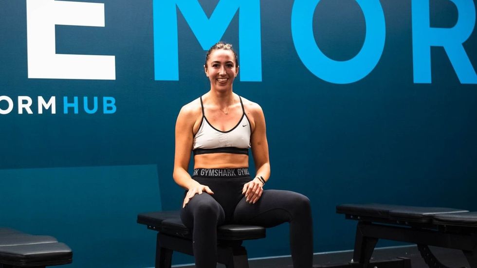 A happy Transform Hub customer at the gym