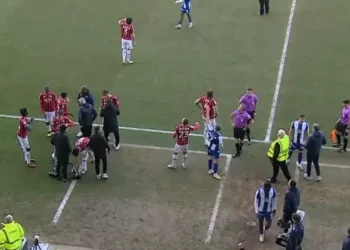 EFL clash between Colchester United and Walsall delayed as drone flies above stadium forcing players to leave pitch and referee to halt match