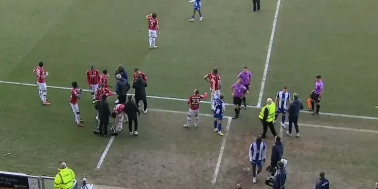 EFL clash between Colchester United and Walsall delayed as drone flies above stadium forcing players to leave pitch and referee to halt match