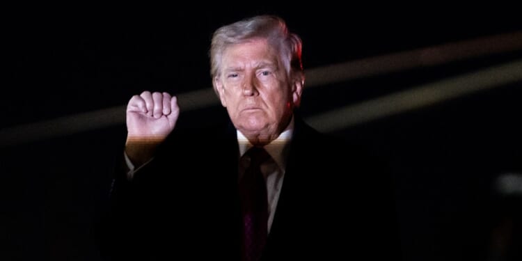 Donald Trump vows to 'take the oil in Iran' with more than 50,000 US troops standing ready in Middle East