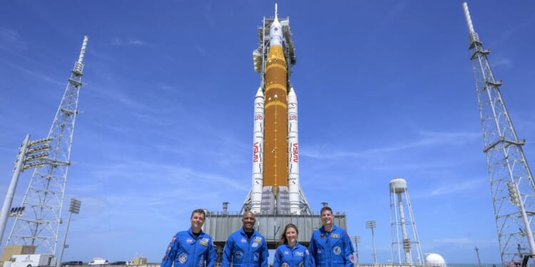 Countdown underway for Nasa's first manned Moon mission in more than 50 years as crew 'ready to go' deeper into space than any human in history