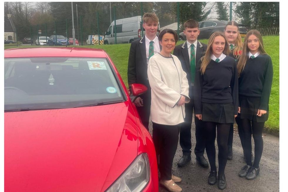\u200bMinister Liz Kimmins alongside students at Erne Integrated College in Enniskillen, who will be among those learning about Graduated Drivers Licensing