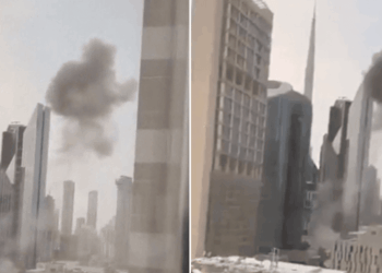 Dubai financial hub rocked by multiple explosions before black smoke spotted billowing above skyline