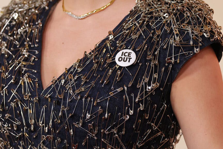 HOLLYWOOD, CALIFORNIA - MARCH 15: Malgosia Turzanska, pin detail, attends the 98th Oscars at Dolby Theatre on March 15, 2026 in Hollywood, California. (Photo by Mike Coppola/Getty Images)