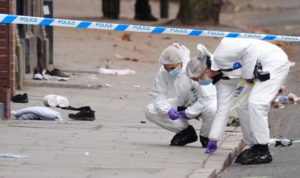 Police conducting forensic investigation work Police conducting forensic investigation work