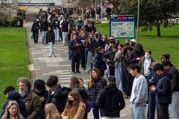 Students queueing for antibiotics Students queueing for antibiotics