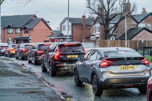 Nantwich, Cheshire, England, January 21st 2026. A row of cars are stuck in a traffic jam on a town street.