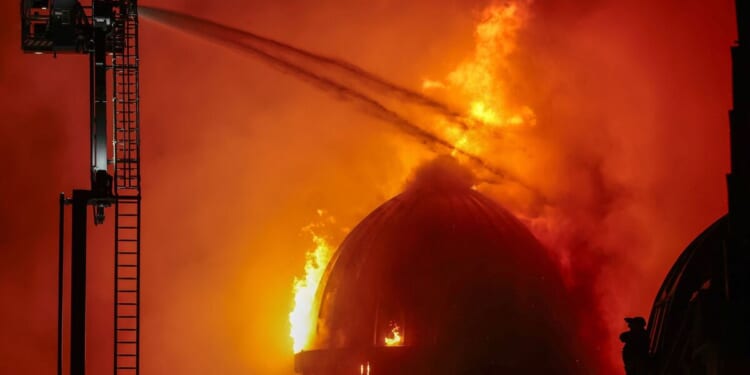 Travellers face commuter chaos after huge fire shuts station | UK | News