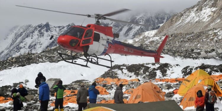 Mount Everest plagued by poisonings and fraud as police uncover criminal network of 'fake rescues'