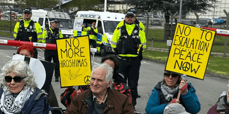 Two demonstrators arrested outside RAF base during peace protest against Iran war