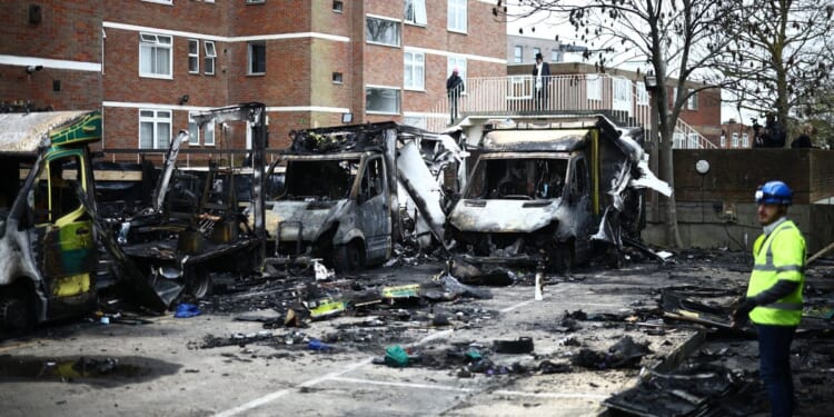 Fourth man arrested after attending hearing for three other suspects and being recognised by police