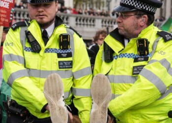 Met Police arrest more than 200 protesters supporting banned terror group