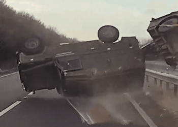 Two soldiers injured after military Land Rover and trailer flips over dual carriageway in horror crash