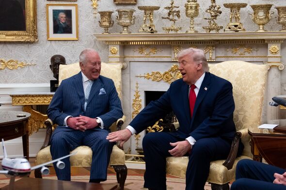 Donald Trump touches King Charles's leg at the White House