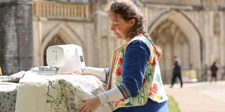 Artist uses pedal power to sew scene of Winchester Cathedral