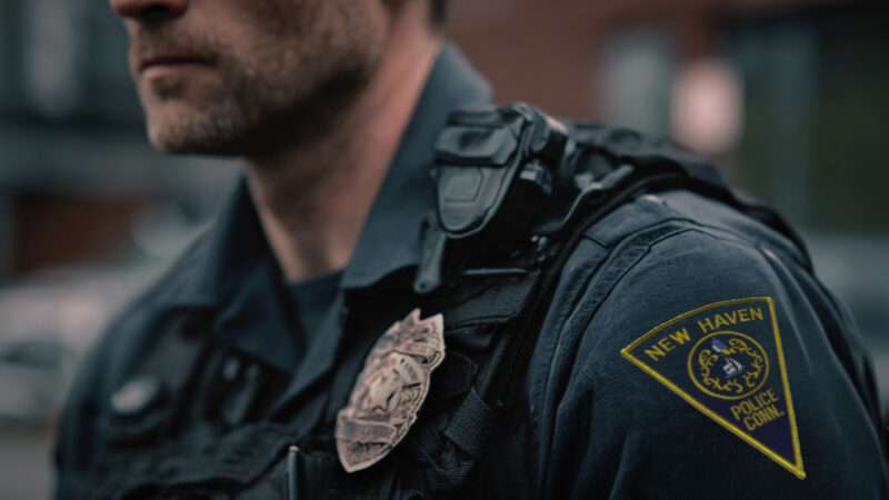 Close-up of a New Haven, Connecticut, Police officer's shoulder patch | Midjourney/New Haven Connecticut Police Department/Wikimedia Commons