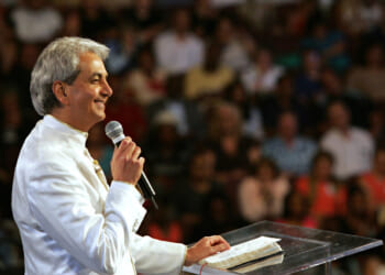 Court requires bank to seize assets from Benny Hinn Ministries after failure to pay marketing company