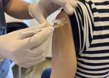 Millions urged to get new Covid jab as 'immunity wanes'