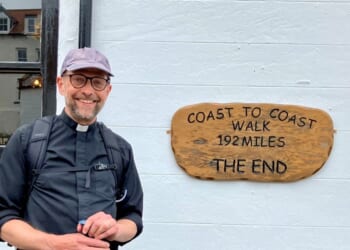 Priest walks 192 miles for 192 feet of spire