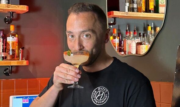 Jack McEntee sips drink in one of his pubs