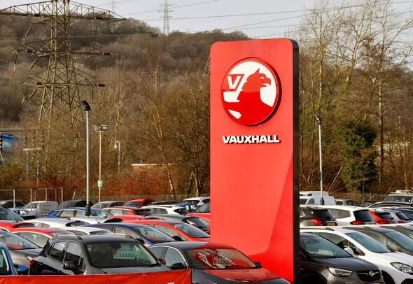 Tall sign on the forecourt of a Vauxhall car dealership
