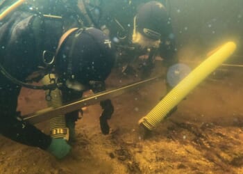 Underwater divers unearth new secrets of artificial island older than Stonehenge